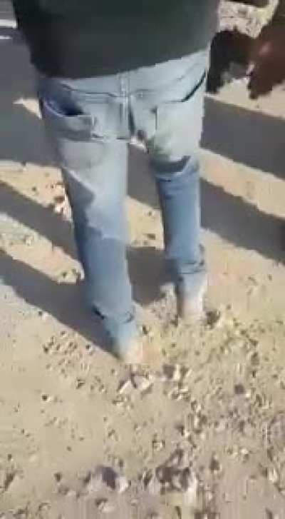 An absolutely horrendous microcosm of israel apartheid occupied Palestinian territories today. Palestinian Harun Abu Aram desperately tries to rescue his electric generator which israeli occupation soldiers have seized. So a soldier shoots him. Harun is n