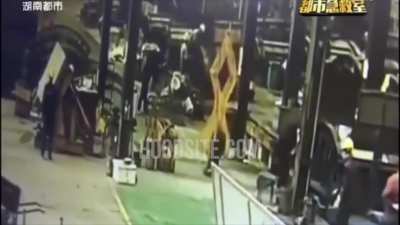 Giant clamp fails and catches a person