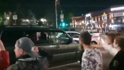 RU POV: Russian Citizens who Support the Wagner PMC Group spoke to Yevgeny Prigozhin and thanked him as his Car left the Southern Military District Headquarters in the City of Rostov.