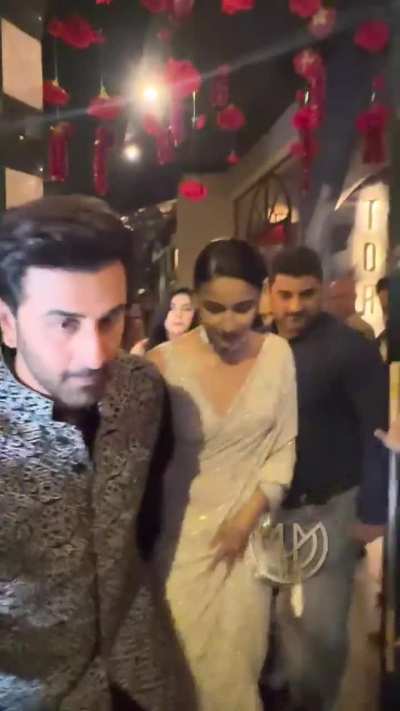 Captured Ranbir Kapoor and Alia Bhatt stepping out after a friend’s wedding-no red carpet, no poses, just a soft candid moment