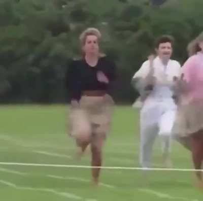 1991, Princess Diana breaking royal protocol by participating in a Mother's Day race at Prince Harry's school.