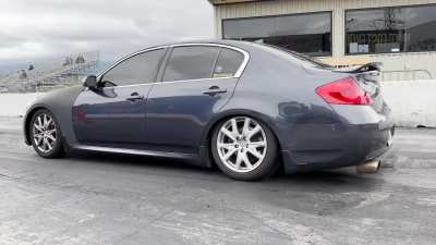 My 28 year old Nissan's still got it. Roasting some tires and drag racing a G37s in my '95 300ZX