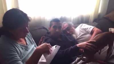 Son, who just sold his first app, surprises his parents by paying off their home.