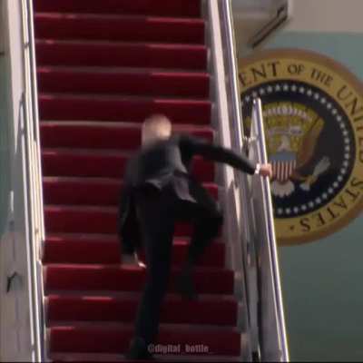 sus!!!@! Stairs = red, biden suit = black hand rail = white! 😳😳😳😳😳😳😳