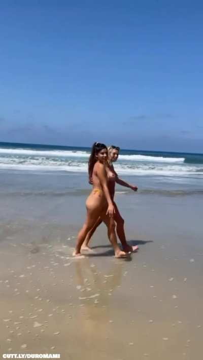 Friends playing at the beach