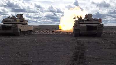 Abrams main gun slowmo footage.