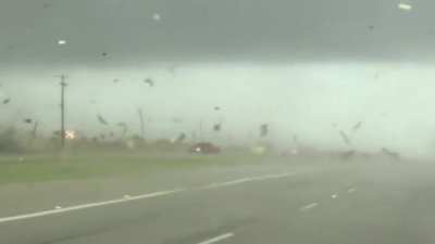 I can't believe how that red van got out of this tornado unscathed