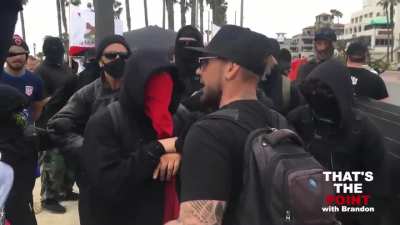 1 Savage Street Journalist throws hands with the mob.