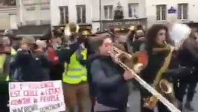 the brass section, bringer of music, slayer of cops