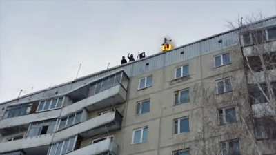 Man sets himself on fire and jumps off building into snow (sfw I promise)