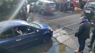 Idiot getting a tow with steering lock on?