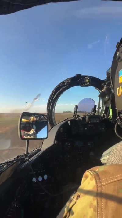 A pair of Mi-24 attack helicopters firing S-8 rockets at Russian targets and retreating while activating countermeasures. 12th Separate Army Aviation Brigade, September 2024.