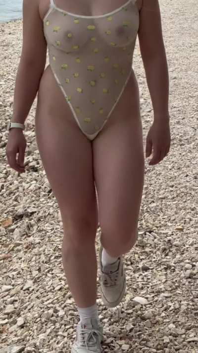 walking on the beach in my sheer swimsuit