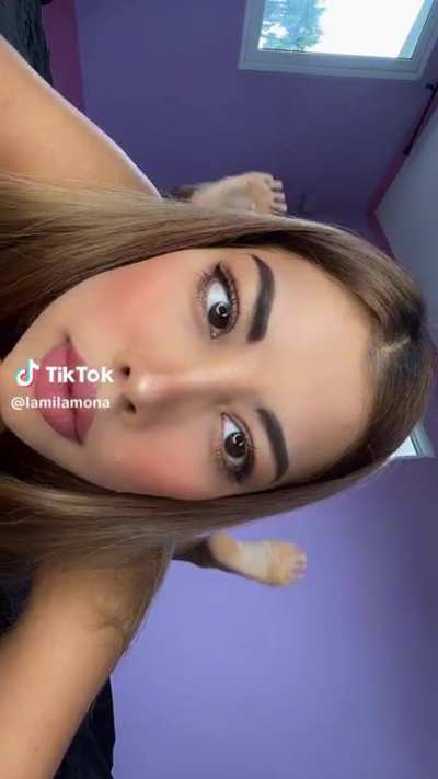Braced faced Latina showing soles