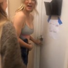 Undressing in the hallway