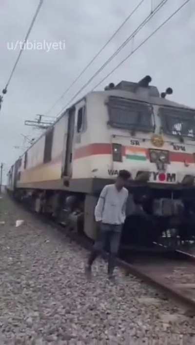 train helps man get up from the ground (truly heartwarming)