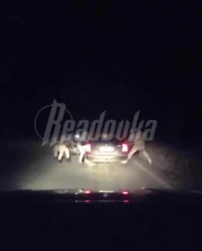 Translation from the telegram chat description: “Azov militants shoot civilians right on the highway near Mariupol. Really scary video”