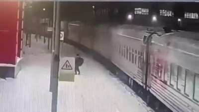 Drunk russian back from the front gets decapitated by a train. NSFL. 