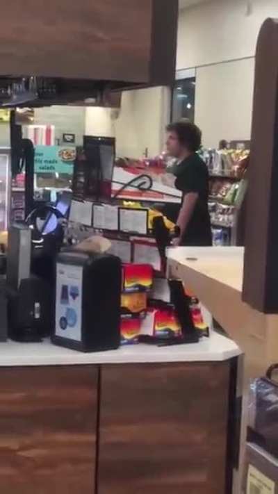 Guy gets knocked out cold at wawa in Philadelphia.