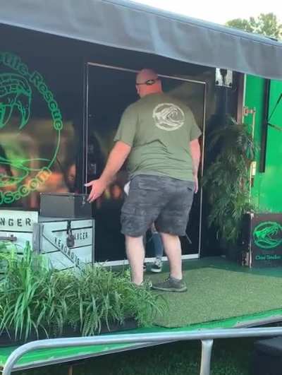 Opening a cottonmouth snake box