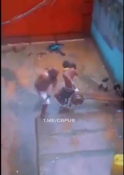 Tied to a bar and used as a punching bag