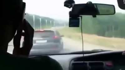 Guy driving like an idiot,tailgates a man who is driving with his wife and child. The idiot then passes and brake checks the family and corners them in with no escape leaving the dad no option but to protect his family. Idiot driver gets a lesson in 