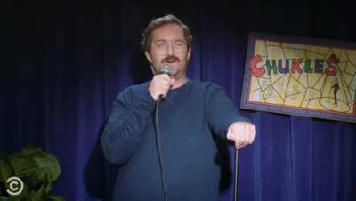 Sam's joke on Trevor's Comedy Central show. Sam's mustache proves that this is not a joke.