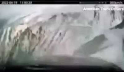 Truck Driver’s dash cam captures the moment they slid off a snowy road and off the edge of a mountain…