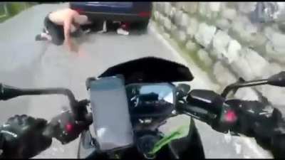 Trying to pass a car by sliding under it