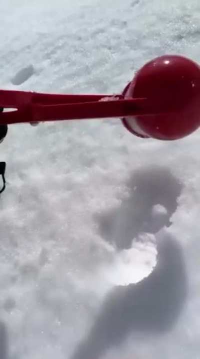 A perfect snowball, a perfect fall