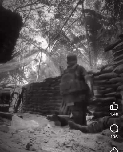 Young Cambodian soldier of the RCA filming social media clip of himself in frontline action, somewhere in the ongoing Thailand-Cambodia border conflict.