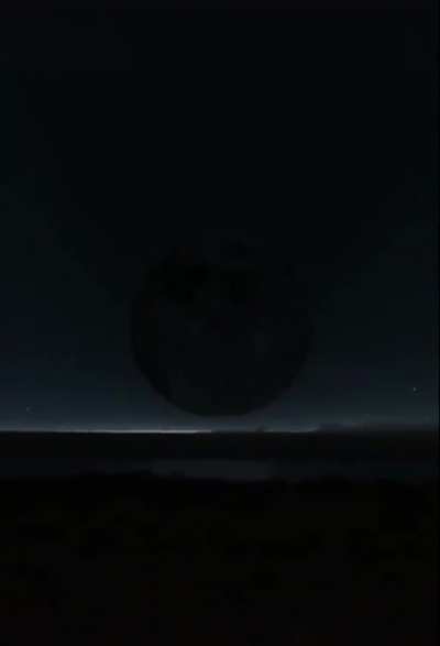Imagine large moon between Canada and Russia blocking sun for few seconds to create darkness.