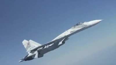 Su-27 Flanker unsafely intercepts B-52