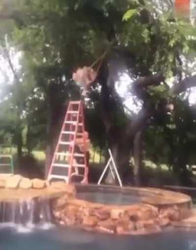 After climbing up an 8 foot ladder, his hands slip he falls and slams his spine into a jacuzzi rockwall
