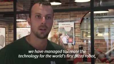 A pizzeria in Paris that is operated entirely by robots - from dough to boxed pizza