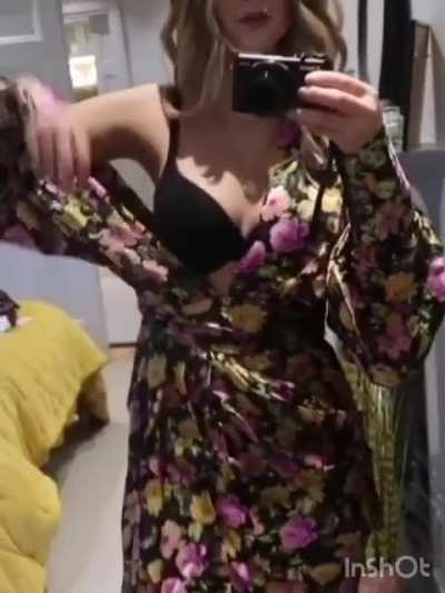 Touching her boob