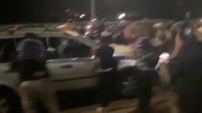 Car drives through BLM protestors
