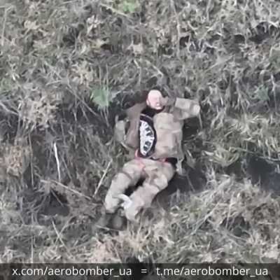 A russian invader was hit by a drone-dropped grenade and then proceeded to kill himself by stabbing a knife into his chest. Video by the Ukrainian 30th Mechanized Brigade 