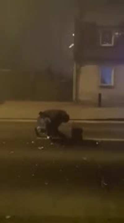 Using some low quality fireworks in the middle of a road at night. [NSFW]