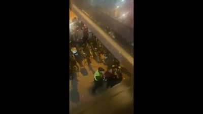 BBC Journalist Edward Lawrence was sieged and arrested in Shanghai. His friend said it was because he was filming the protests.