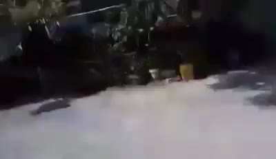 Myanmar army soldiers shooting RPG into a house of protesters. Mandalay, Myanmar