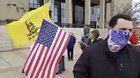 Guy has an announcement to make during a protest