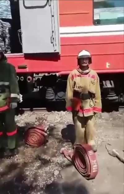 Russian firefighter shows how to get the job done .