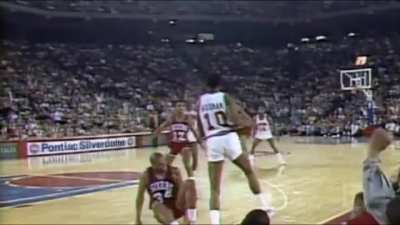 Charles Barkley and Dennis Rodman battle for a rebound
