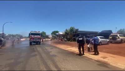 Police and Firefighters join water fight on a 47°C Christmas day in Western Australia