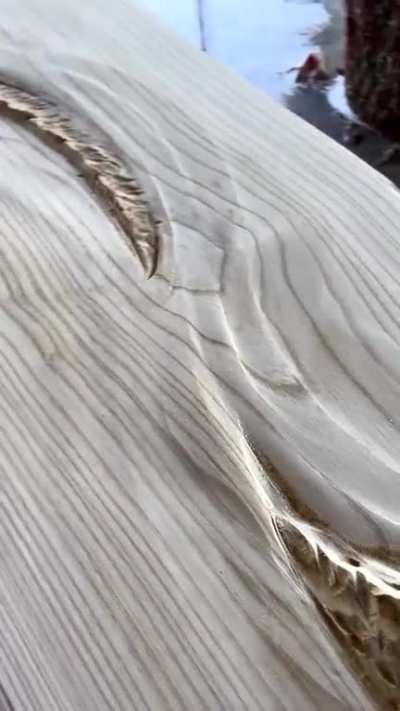 This wooden, hand carved bar top.