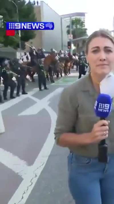 Australian Journalist Takes Rubber Bullet From LAPD Like A Champ.