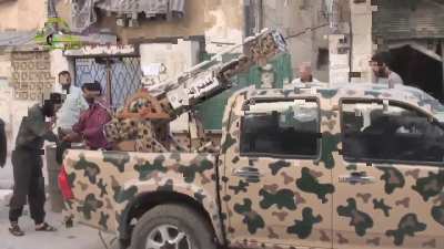 FSA operates a homemade & hand-painted cannon designed to target Syrian Army positions with mortar shells - Aleppo - 6/22/2014