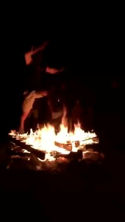 Jumping over a fire.