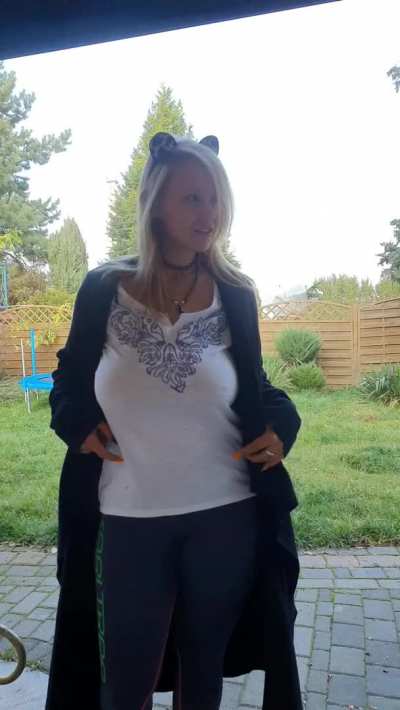 A quick flash of big boobs in the backyard because the neighbor is peeking...heh